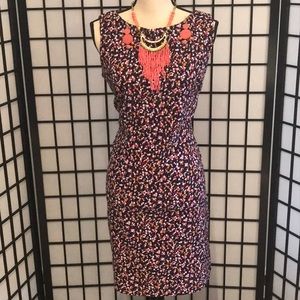 A multicolored sleeveless mid length dress